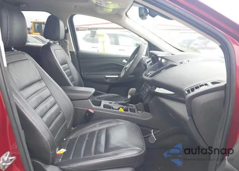 2017 Ford Escape Titanium z USA, uszkodzony, nr VIN 1FMCU9J95HUE90048